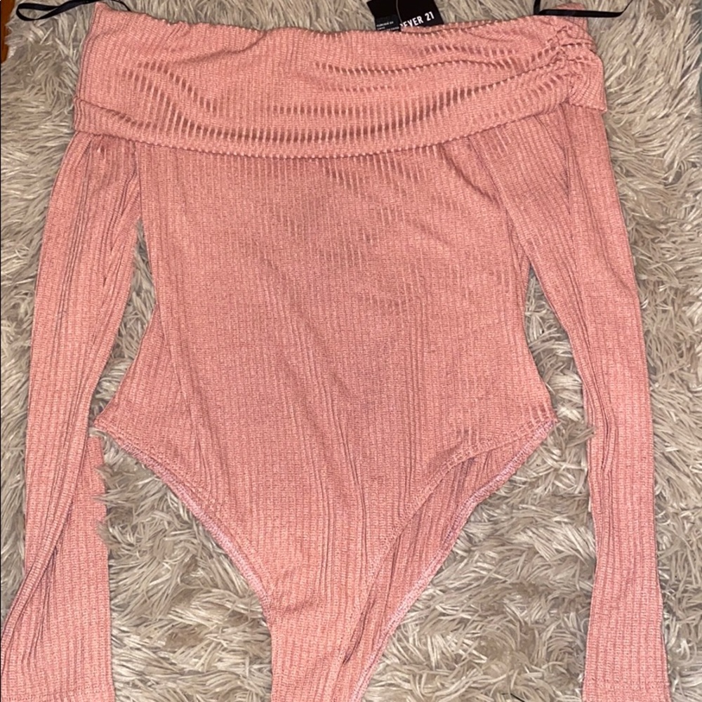 pink body suit